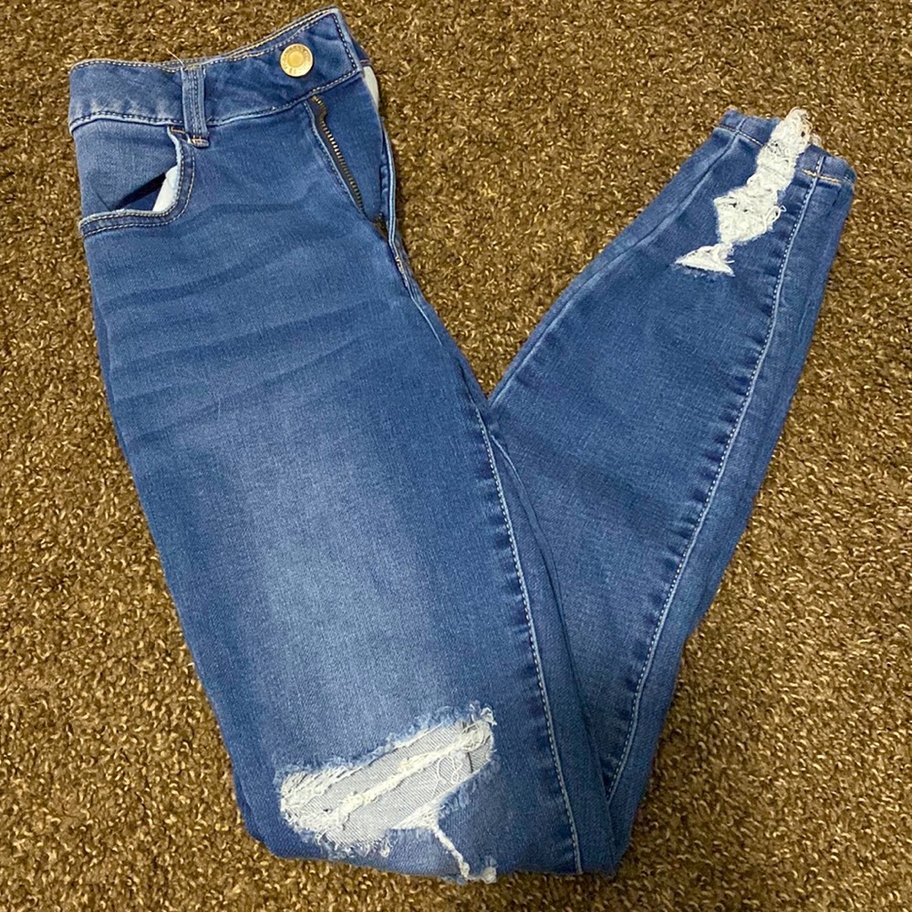 Ripped High Rise Skinny Jeans.